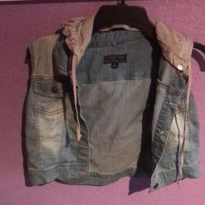 Denim vest with gray hood